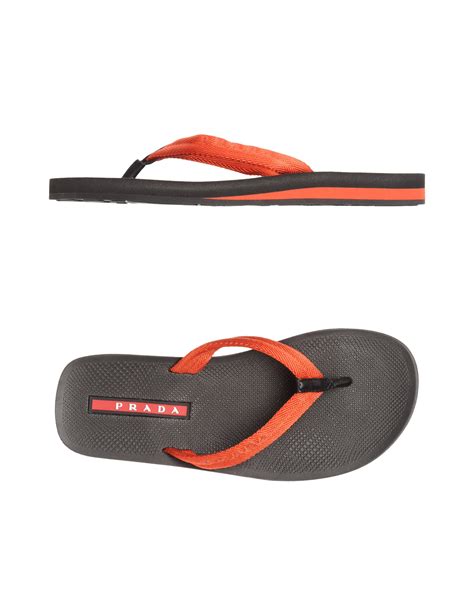 prada orange flip flops